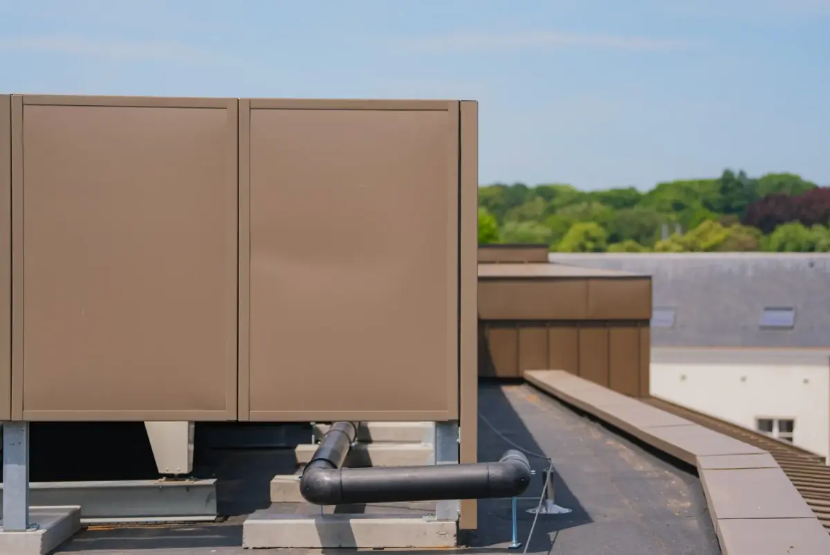 Noise-Reducer panels around a rooftop installation with air handling units